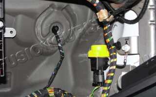 Где проложен трос акпп ford fusion