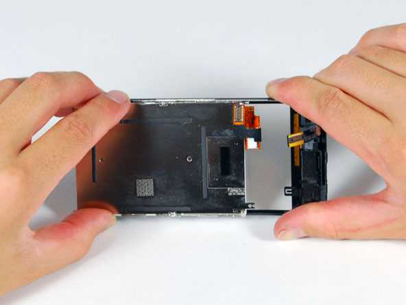 Извлечение и замена внутренних компонентов iPhone SE