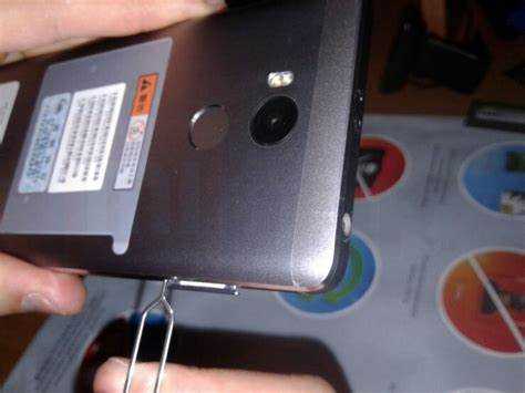 Как достать симку из xiaomi
